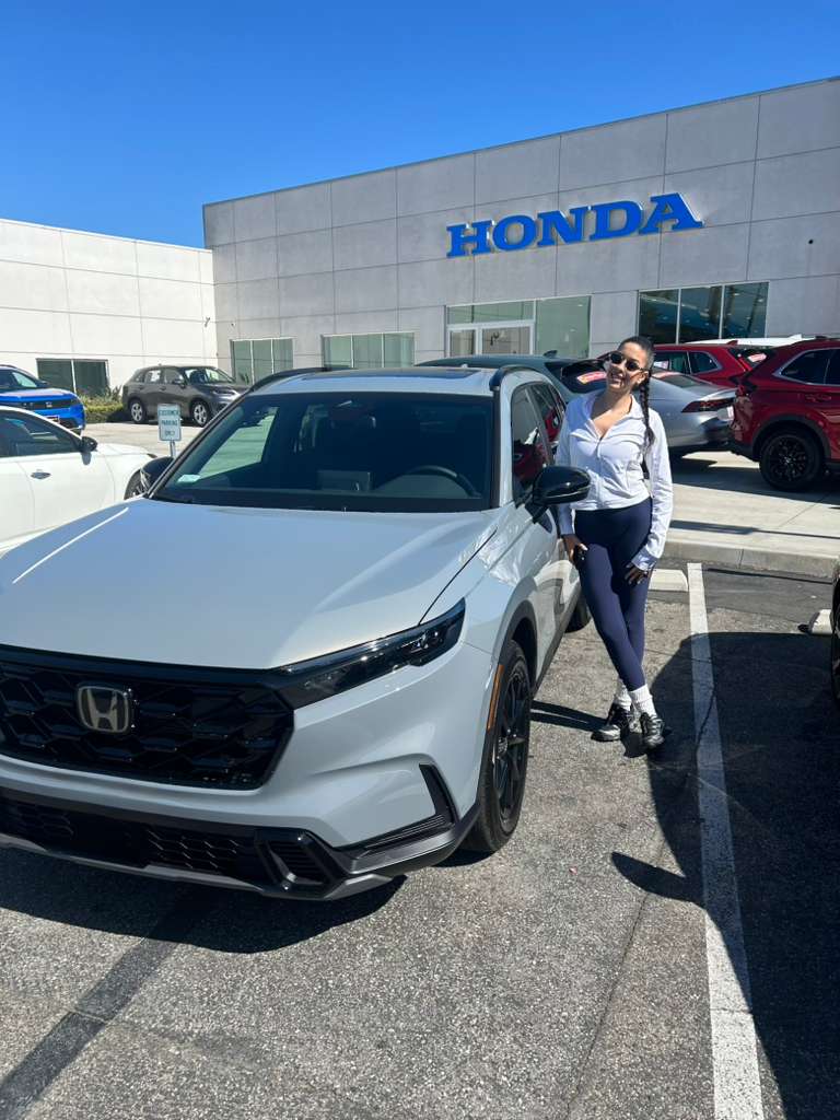 Client vehicle delivery — SUV at Honda dealership